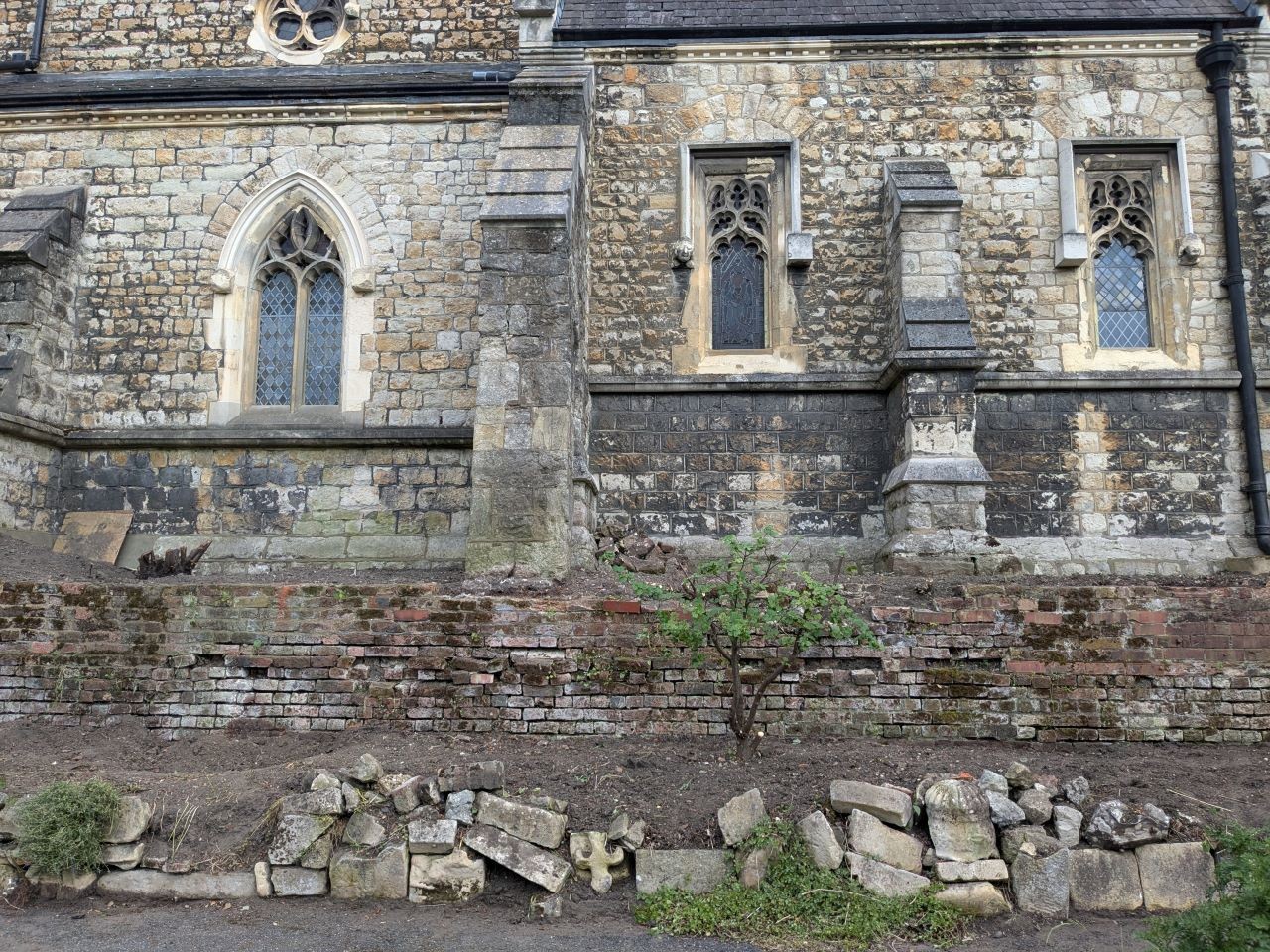 Clearing of vegetation for a closer look at the foundations.  May 2025
